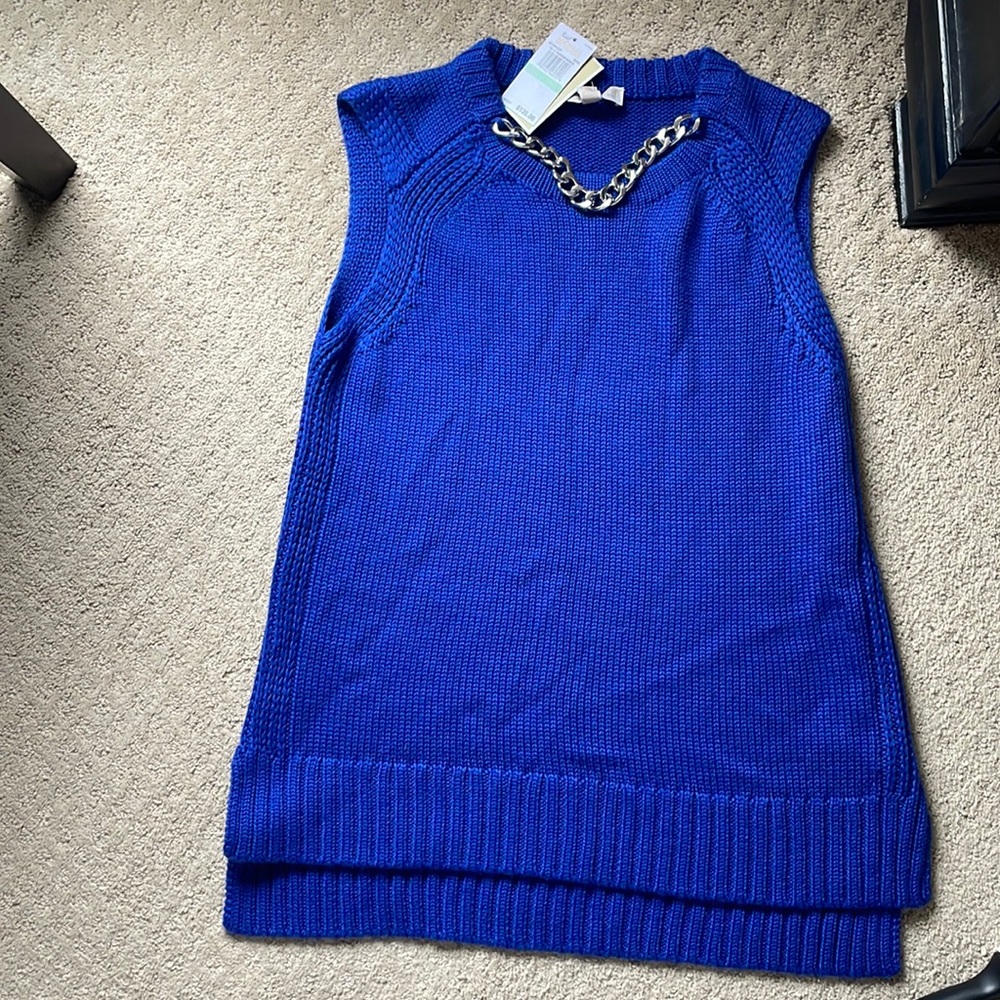 Royal blue sweater with silver rope chain necklace